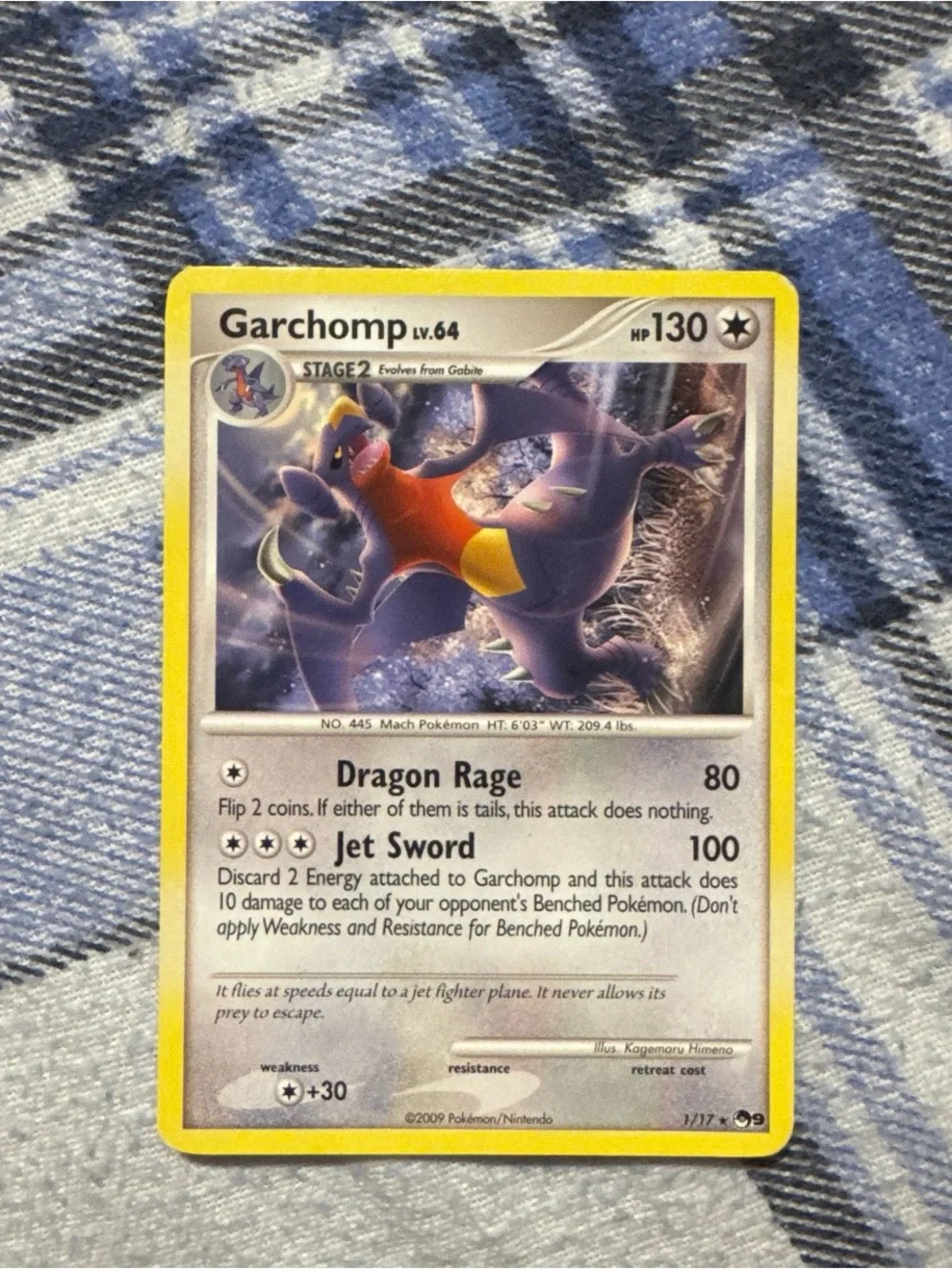 Pokemon Garchomp Trading Card with Yellow Border and Purple Artwork